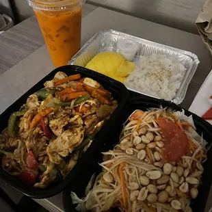 two trays of food on a table