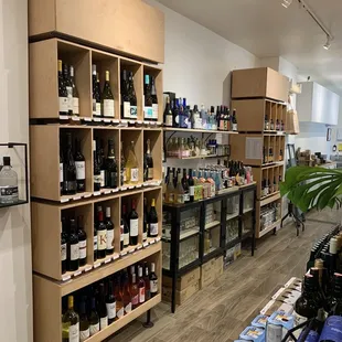 a wine store with shelves full of bottles of wine