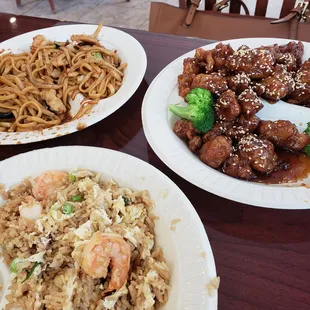 three plates of food on a table