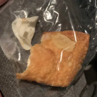 CRAB RANGOON WITH GLOVE INSIDE IT