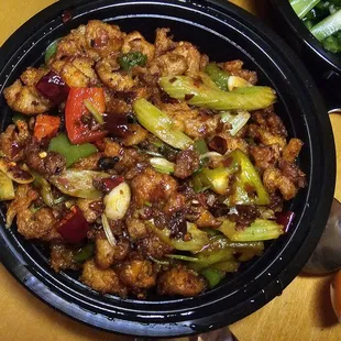 Diced chicken with three  peppers.
