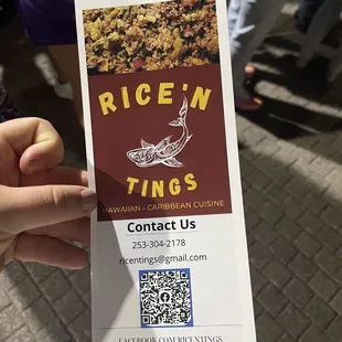 a person holding a business card