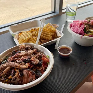 Pulled pork rice bowl, waffle fries, veggie rice bowl.