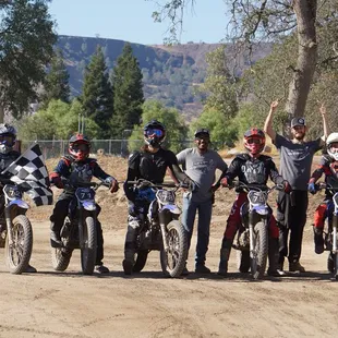 In this photo, Rich is on the left.  That's me with the checkered flag after winning a 20-lap flat track race.  Ed Sorbo