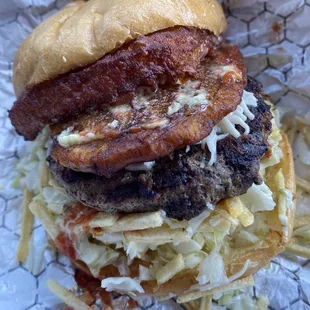 RUTA 6 - 6 oz. Angus beef, sweet plantain, fried cheese, diced cabbage, potato sticks, shredded cheese, etc.