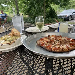 Pepperoni &amp; sausage brick oven pizza, and cheese tortellini with mushrooms &amp; artichoke hearts with alfredo sauce.