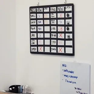 a dry erase board on the wall