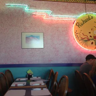 a neon sign in a restaurant