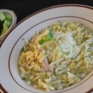 a bowl of pasta and broccoli