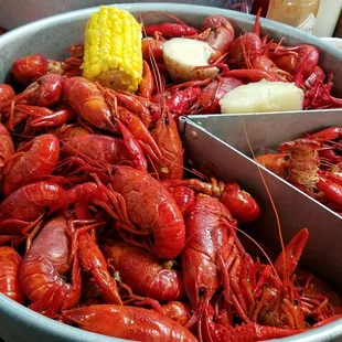 a bowl of craws and corn