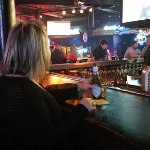 a woman at the bar