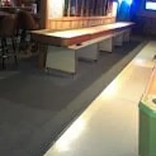 a pool table and a bar