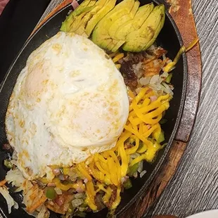 Meat lovers skillet with avocado