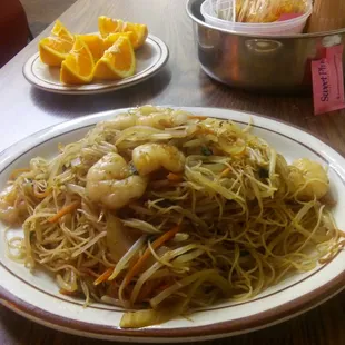 Shrimp mei fun on a plate at a takeout joint yummy yummy.