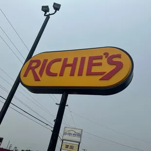 a large sign for a restaurant