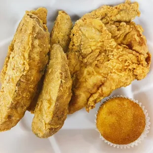 Chicken dinner, with a side of potato wedges and cornbread!