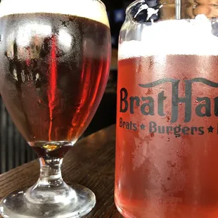 a glass of beer next to a glass of beer