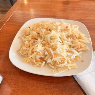 The second try on the hash browns. Kinda oily. Kinda barely if at all cooked.