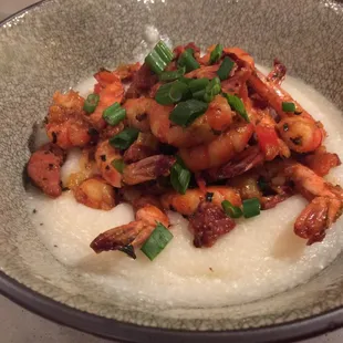 a bowl of shrimp and grits