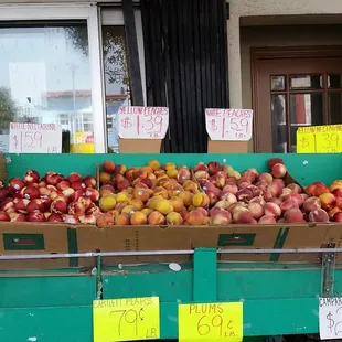 Some of the well priced fruit in front of the store