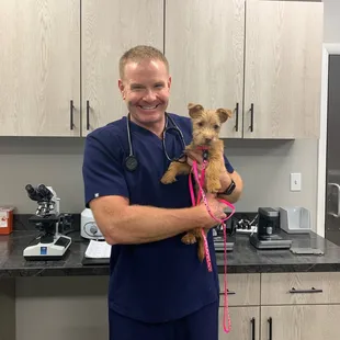 Pink! getting snuggles from Dr. Smith during her first visit!