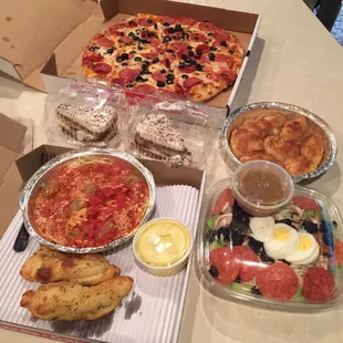 Large olive &amp; pepp pizza, spaghetti &amp; meatballs, garlic bread w/butter dipping sauce, antipasto salad w/Italian, cinnamon rolls &amp; tiramisu!