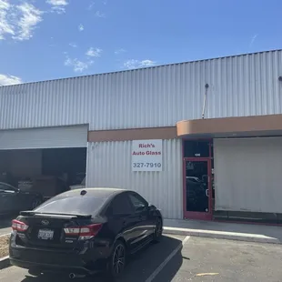 front of business - off main street behind the front building. area opens up after the first building.