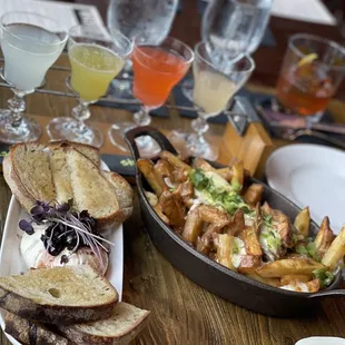 Margarita flight, pulled pork poutine, and burrata - perfect appetizer!
