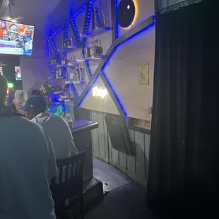 a man sitting at a bar