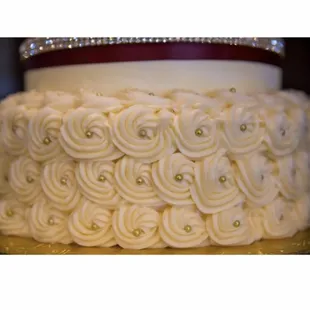 a closeup of a wedding cake