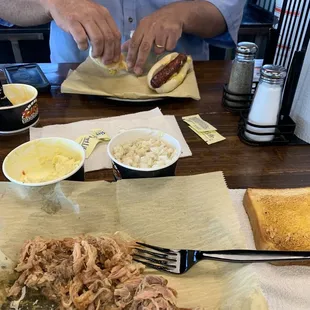 Slaw dog with Mac&amp; cheese. Pulled pork plate with vinegar slaw and potato salad.
