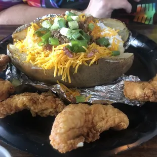Loaded baked potato with chicken tenders