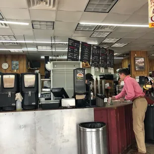 a man standing at the counter