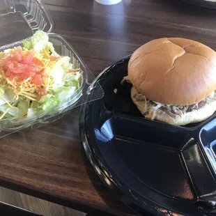 Pork sandwich and side salad