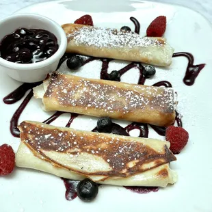 Cheese blintzes with berry compote