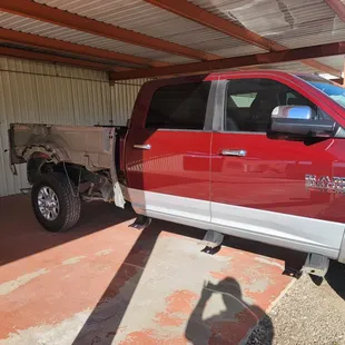 Dodge Laramie getting repaired from equipment moving around in the bedside and creating damage. We can fix your fleet work trucks too!