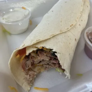 Pork burrito - filled to the max! Just wish they heated/grilled the tortilla too