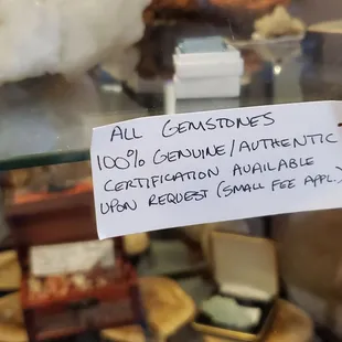 a sign in a glass case
