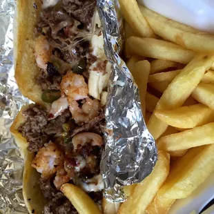 SURF &amp; TURF: $7.95; with fries and a refillable cold drink just $10.50 after tax. That&apos;s cheaper than Burger King!