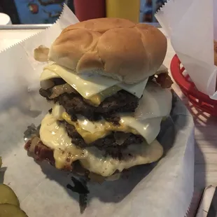 a cheeseburger and pickles