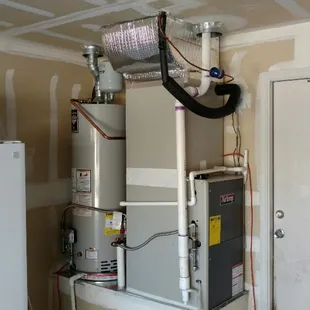 New Water Heater, and Furnace with indoor refrigeration coil.