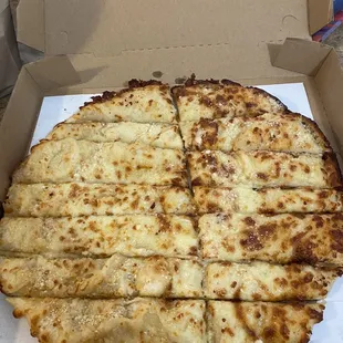 a cheese pizza in a box
