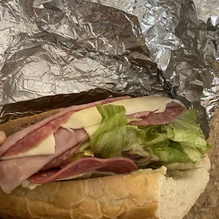 a sandwich wrapped in foil