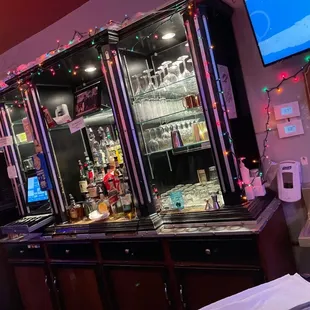 a bar with a television in the background