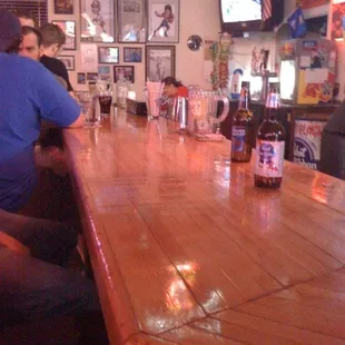 people sitting at the bar
