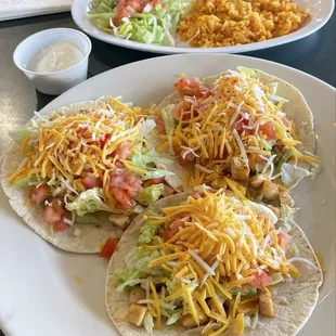 Soft shell flour grilled chicken tacos.