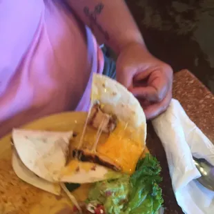 Supposed to be a lunch quesadilla,1 small tortilla folded with 2small pieces of chicken &amp; melted cheese. Wasn&apos;t even grilled for $8.99