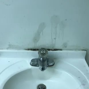 a dirty bathroom sink