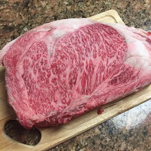a piece of beef on a cutting board