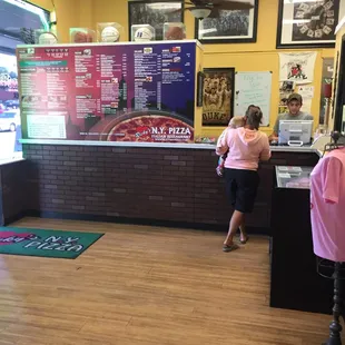 a woman ordering pizza